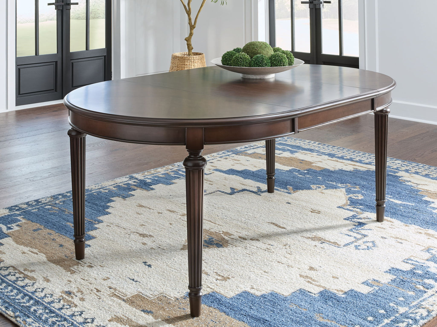 Lavinton - Oval Dining Room Extension Table - Brown